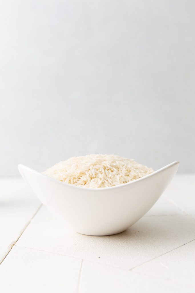 a bowl of white rice as a pantry essential ingredient for budget meals
