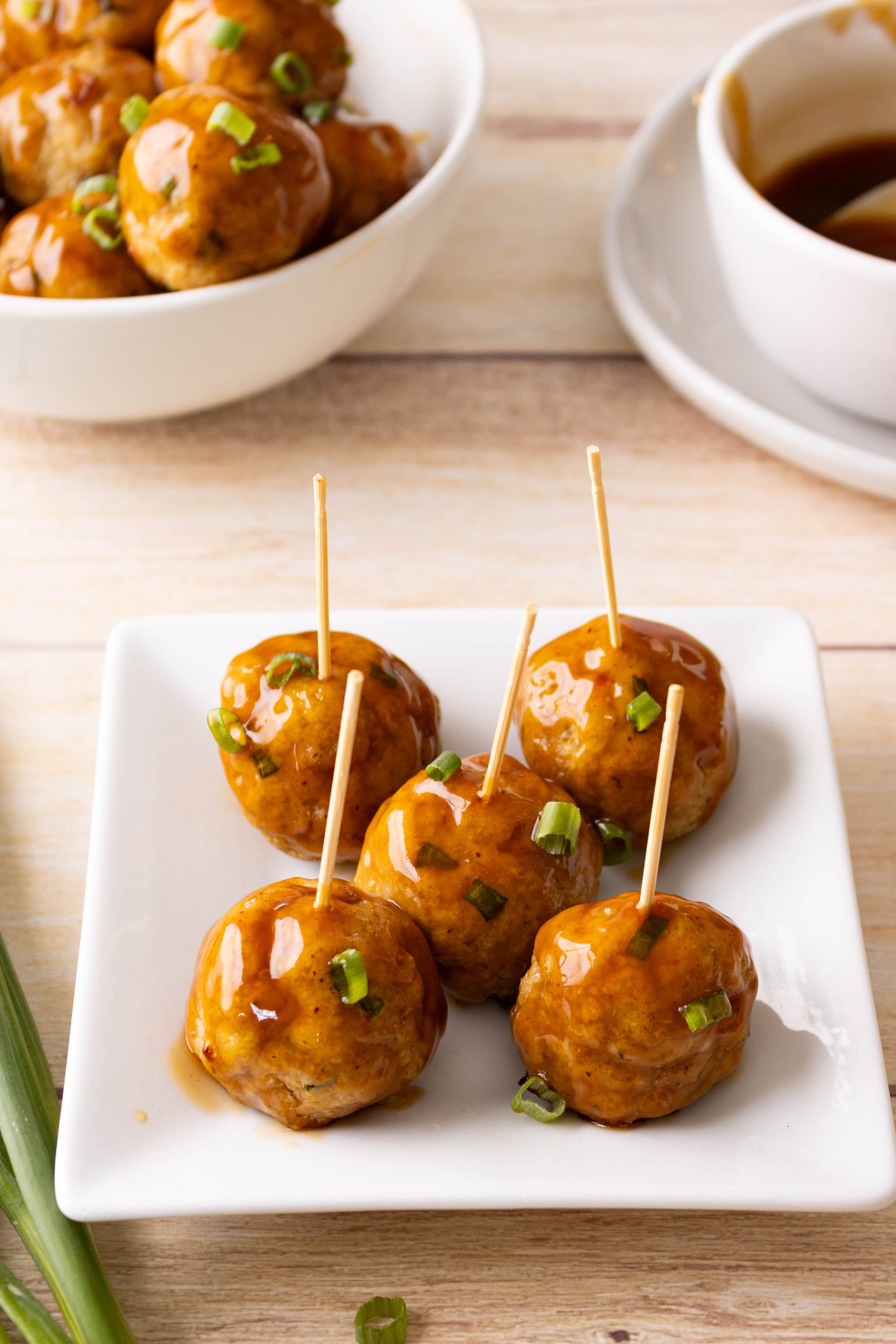 sweet and sour baked chicken meatballs served as a party appetizer dish.