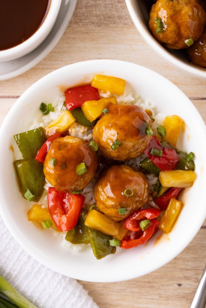 oven baked chicken meatballs served with sweet and sour sauce